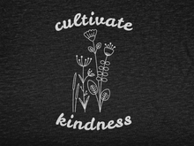 Load image into Gallery viewer, A close-up of the print cultivate kindness and flowers