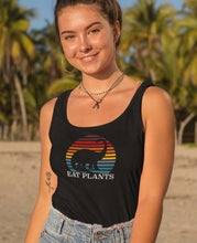 Load image into Gallery viewer, Eat plants dino tank top in black on a model
