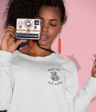 Load image into Gallery viewer, Model with a camera wearing a white leave my tits alone vegan sweatshirt