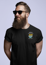 Load image into Gallery viewer, Spread Hummus Not Hate embroidered black vegan t-shirt on a male model