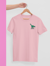Load image into Gallery viewer, Urban herbivore vegan t-shirt in pink on a hanger.