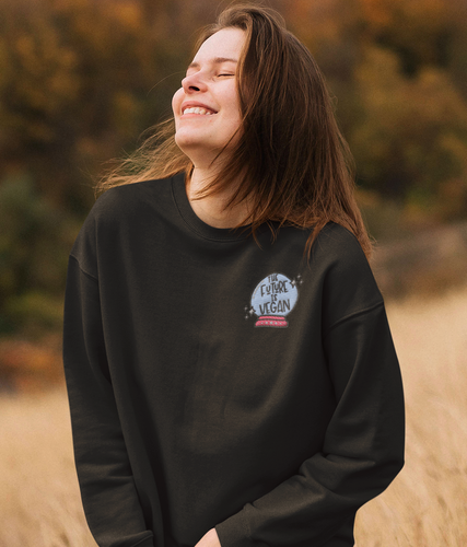 Model wearing black the future is vegan embroidered sweatshirt.