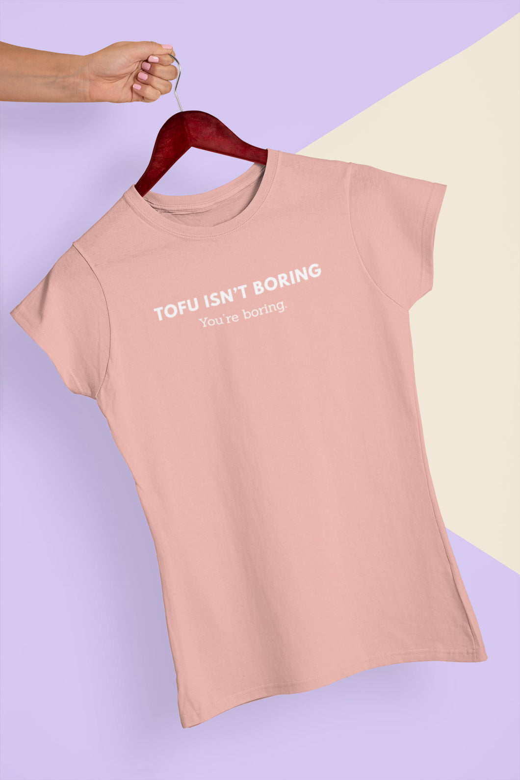 Pink tofu isn't boring, you're boring t-shirt on a hanger.