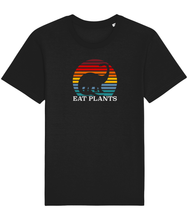Load image into Gallery viewer, Black vegan shirt with a picture of a dinosaur in a rainbow sun and the words eat plants.
