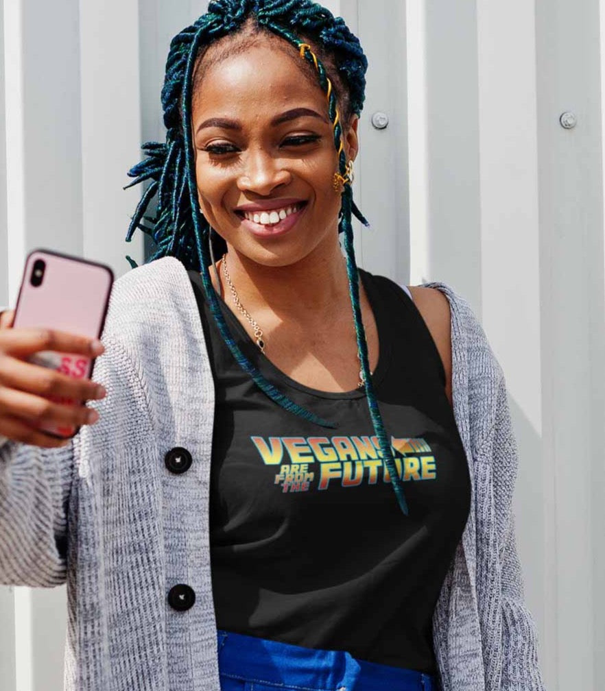Vegans are from the future black tank top on a model with a phone